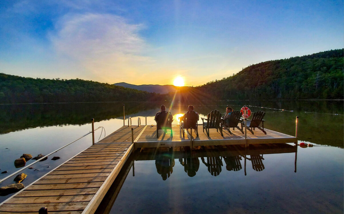 adirondacks sunset by lake - Himalayan Institute